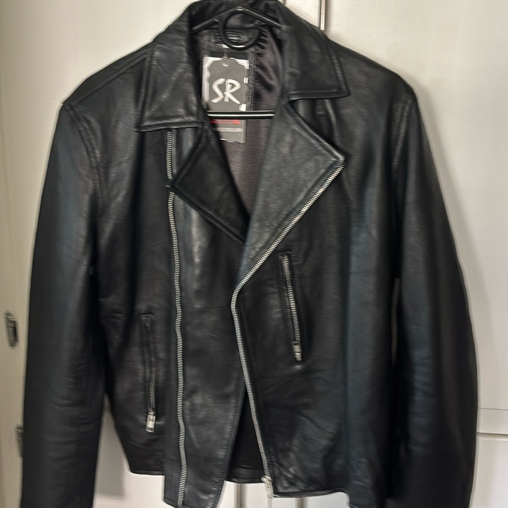 Motorcycle black genuine leather jacket, new with tags.